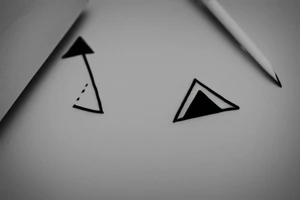 Triangle with two parallel lines crossing it parallel to the base. Small. Simple minimalist tattoo idea