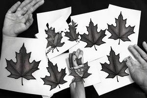 boy holding maple leaf tattoo idea