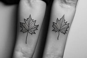 boy with maple leaf on hand tattoo idea