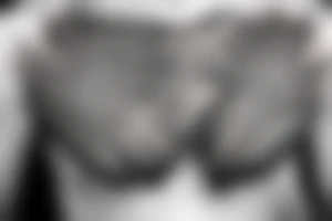 eagle wings on man chest tattoo idea