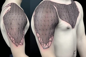 glowing biological cells coming together in a geometric pattern on the shoulder tattoo idea