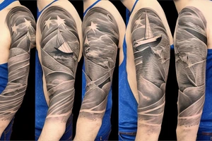 1/2 sleeve tattoo of a damaged ship, sailing in rough seas with a large star on the top of the shoulder tattoo idea