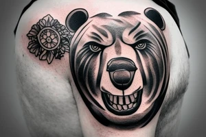 Man shoulder tattoo of a bear's face with large eyes and strong glance tattoo idea