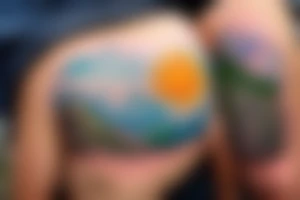 a little man sitting on the edge of a mountaintop watching the sun rise.  full color, highly detailed, circular tattoo idea