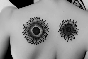 A small sunflower with a number 7 tattoo idea