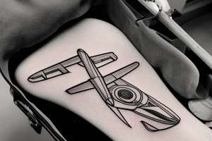 a minimal tatoo shows an airplane flying out of a suitcase to travel tattoo idea