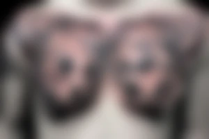 Chest tattoo bear cub tattoo idea
