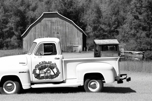 a rustic 1953 GMC 5th window farm
truck with an old red country barn in the background. tattoo idea