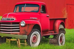 a rustic red and white 1953 GMC farm
truck and 5010 John Deere tractor with an old red barn in the background tattoo idea