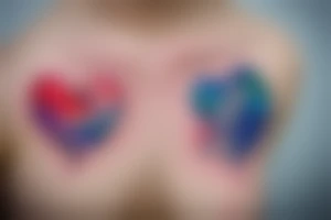 watercolor small shoulder tattoo of a wave contained partly in a heart. Add a small chickadee above the heart. Vivid colors. tattoo idea